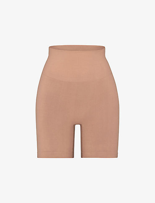 SKIMS: Smoothing mid-rise stretch-woven shorts