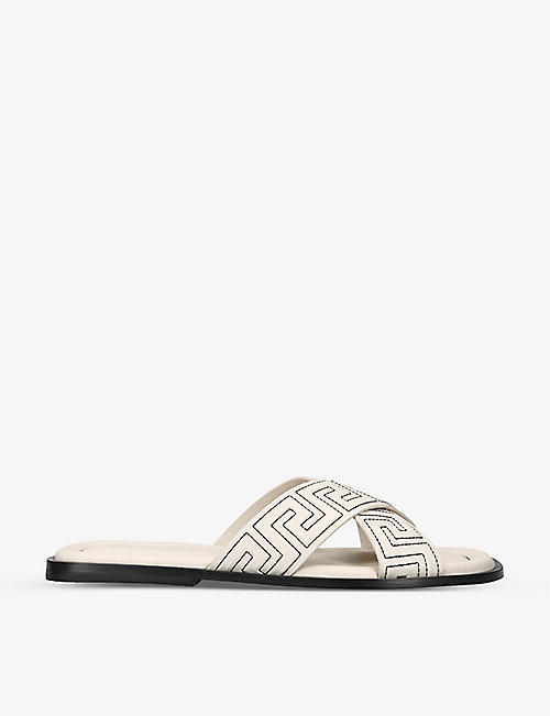 VERSACE: Crossover-strap slip-on leather sliders