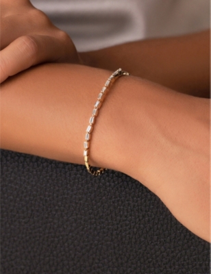 SUZANNE KALAN: Firework 18ct yellow gold and 0.7ct baguette-cut diamond bangle bracelet