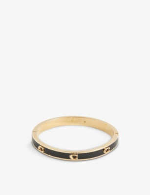 Shop Coach Women's Gold/black Pegged C Monogram Hinged Enamel And Brass Bangle