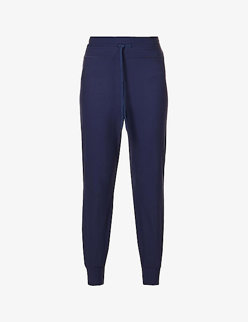 THE UPSIDE: Vida mid-rise tapered stretch recycled-polyester jogging bottoms