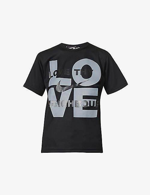 BLACK COMME DES GARCON: Black Comme des Garçons x Nike text-print woven T-shirt