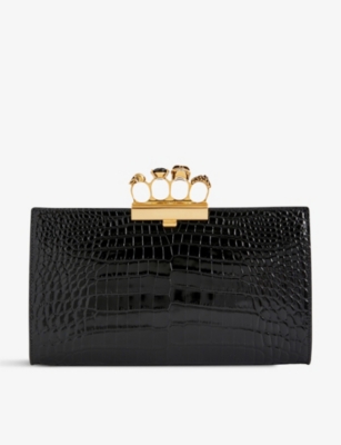 ALEXANDER MCQUEEN: Four-ring croc-embossed leather clutch