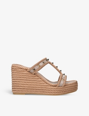 VALENTINO GARAVANI: Rockstud braided leather wedge sandals