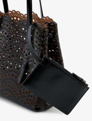 ALAIA: Mina Wave 25 laser-cut leather top-handle bag