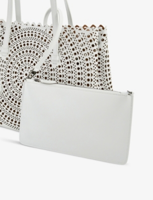 Shop Alaïa Mina Mini Laser-cut Leather Top-handle Bag In Blanc Optique
