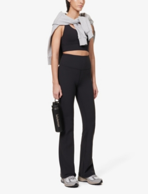 Shop Lululemon Women's Black Groove Flare-leg Stretch-woven Trousers