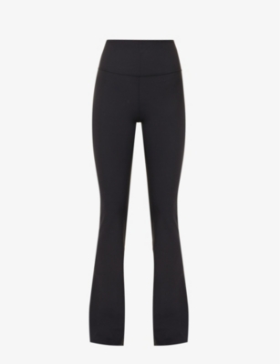 Shop Lululemon Women's Black Groove Flare-leg Stretch-woven Trousers