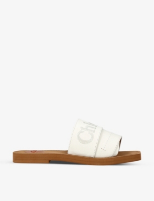 CHLOE Woody logo print leather sandals Selfridges