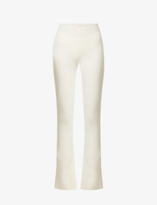 OFF-WHITE OFF-WHITE C/O VIRGIL ABLOH WOMEN'S WHITE SLEEK SPLIT FLARED HIGH-RISE STRETCH-WOVEN LEGGINGS,63828239