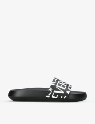 VERSACE VERSACE WOMEN'S BLACK LOGO-PRINT RUBBER SLIDERS,63938518