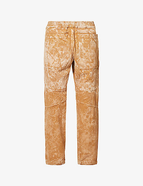ARNAR MAR JONSSON: Tie-dye panelled straight-leg cotton-canvas trousers