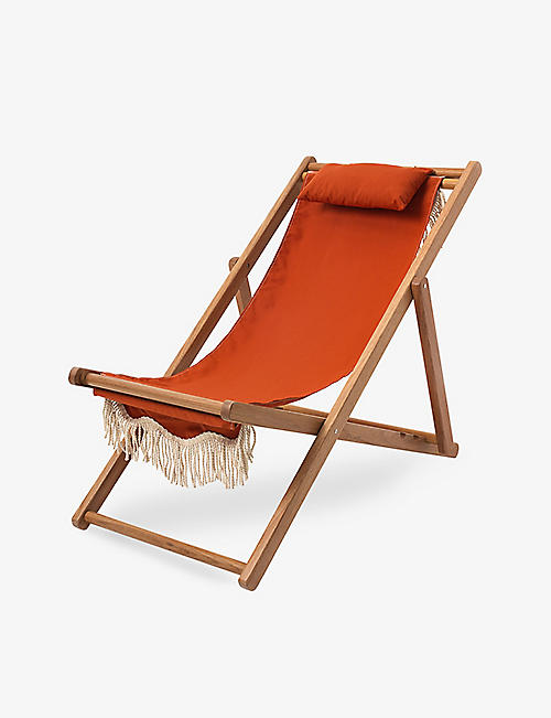 BUSINESS & PLEASURE CO.: The Sling fringe-trim woven deck chair