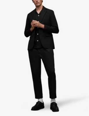 Shop Allsaints Tallis Tapered-leg Mid-rise Cotton-blend Trousers In Black