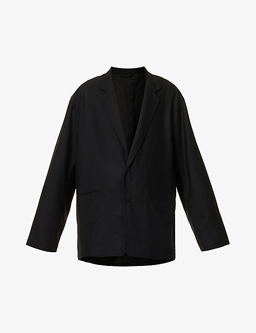 STILL BY HAND: Notched-lapel relaxed-fit wool blazer
