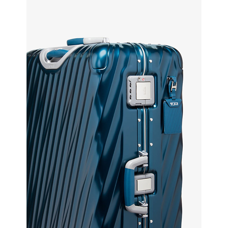 Shop Tumi Extended Trip Expandable Four-wheeled Aluminium Suitcase In Dark Denim