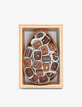 AUTORE: Assorted pralines in milk chocolate Easter egg half shell 700g