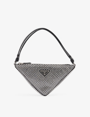 PRADA - Brand-plaque embellished shoulder bag | Selfridges.com