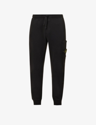 STONE ISLAND: Pocket badge tapered-leg cotton-jersey jogging bottoms