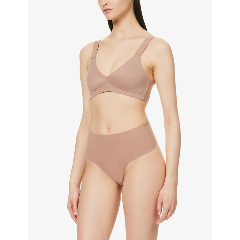 Shop Spanx Women's Cafe Au Lait Undie-tectable Mid-rise Stretch-woven Thong In Nude (lingerie)