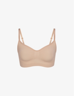 SKIMS: Sculpting scoop-neck stretch-woven bra