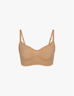 SKIMS: Sculpting scoop-neck stretch-woven bra