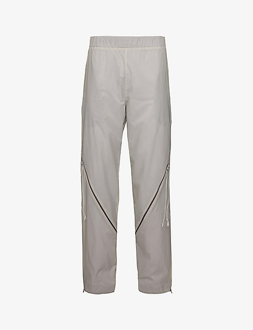 SAUL NASH: Reflective-logo slim-fit tapered-leg shell trousers