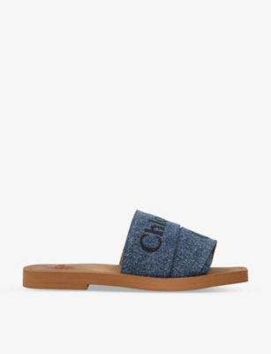 CHLOE Woody logo embroidered denim sandals Selfridges