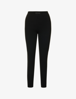 ESSENTIALS FEAR OF GOD ESSENTIALS WOMENS JET BLACK ESSENTIALS SPORT STRAIGHT-LEG HIGH-RISE KNITTED LEGGINGS,66460603