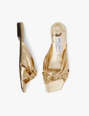 Shop Jimmy Choo Avenue Knot-embellished Leather Mules In Gold