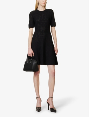 Shop Givenchy Womens Black Monogram-embossed Flared-skirt Knitted Mini Dress