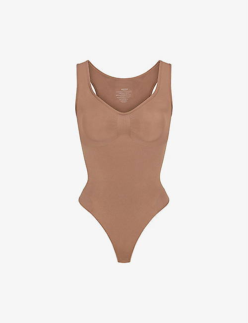 SKIMS: Sculpt ruched stretch-woven body