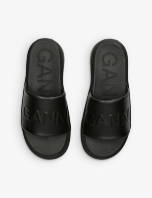 Ganni Logo-embossed Vegan Leather Platform Slides In Black