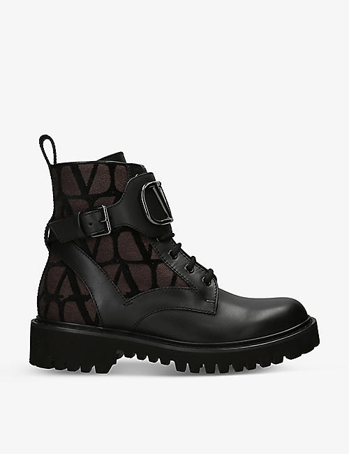 VALENTINO GARAVANI: Rockstud brand-embellished leather combat boots