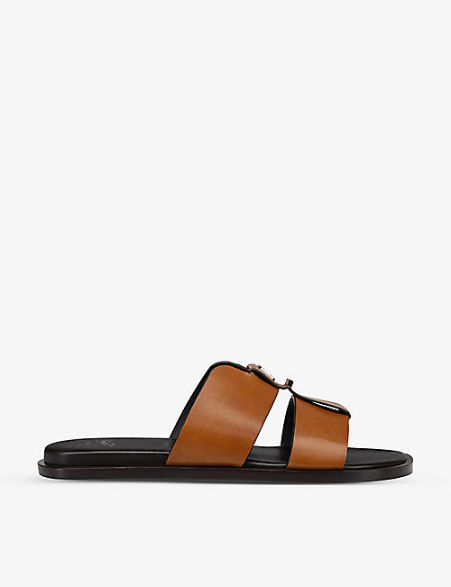 CHRISTIAN LOUBOUTIN: Loubi Be Flat logo-embellished leather sandals