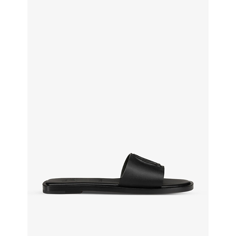Shop Christian Louboutin Cl Logo-embossed Leather Mules In Black