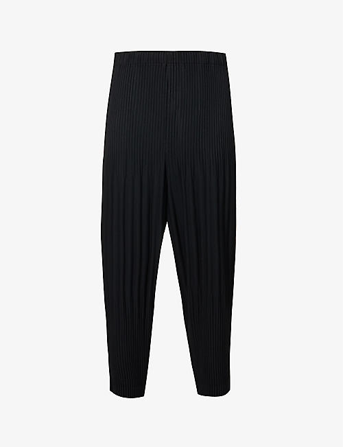 HOMME PLISSE ISSEY MIYAKE: Dropped-crotch pleated relaxed-fit knitted trousers