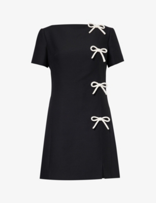 VALENTINO: Bow-embellished split-hem wool and silk-blend mini dress