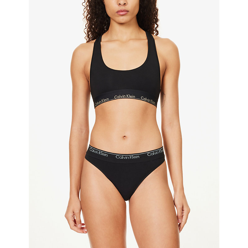 Shop Calvin Klein Modern Logo-embroidered Stretch-woven Thong In Black