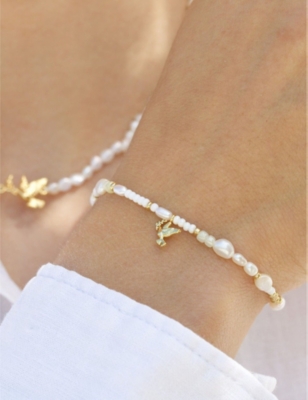 LA MAISON COUTURE WOMENS WITH LOVE DARLING 14CT YELLOW GOLD-PLATED REMELTED BRASS, PEARL AND GLASS BRACELET