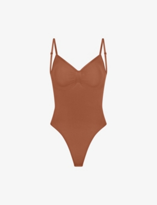 Skims Seamless Sculpt Fitted Stretch-woven Body In Bronze