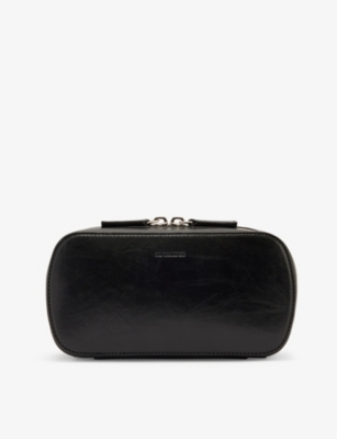 JIL SANDER - Brand-debossed leather crossbody bag | Selfridges.com