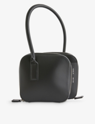 KARA - Stacked leather top-handle bag | Selfridges.com