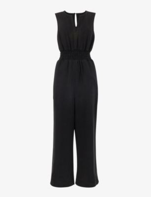 SLEEVELESS LINEN JUMPSUIT IN BLACK