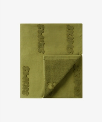 SKIMS SKIMS WOMEN'S CAMO GREEN LOGO-EMBOSSED COTTON-BLEND TOWEL 67536291