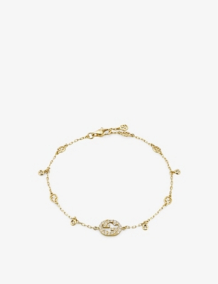 Shop Gucci Women's Yellow Gold Interlocking G 18ct Yellow-gold And 0.2ct Diamond Bracelet