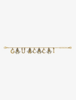 Shop Gucci Women's Yellow Fashion Show Brass Charm Bracelet