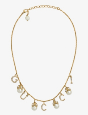 GUCCI: Fashion Show brass charm necklace