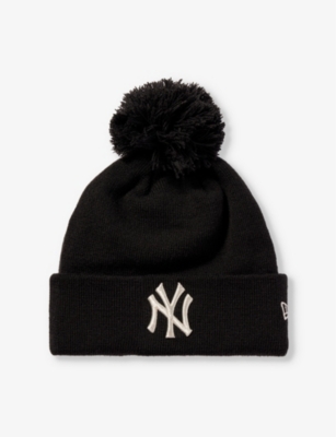 NEW ERA Double pom pom cable knitted beanie hat Selfridges