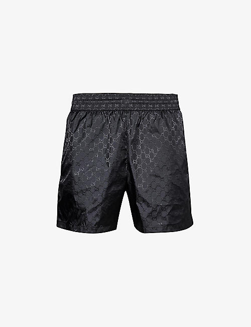 GUCCI: Monogram-pattern mid-rise swim shorts